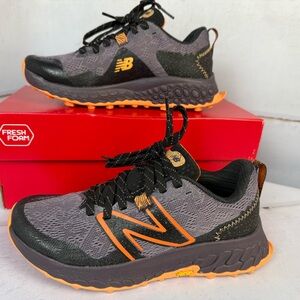 New Balance Black and Orange Trail Sneakers
